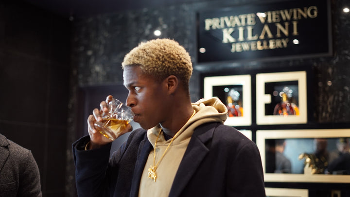 Daniel Caesar receives Golden Child pendant from Kilani Jewellery