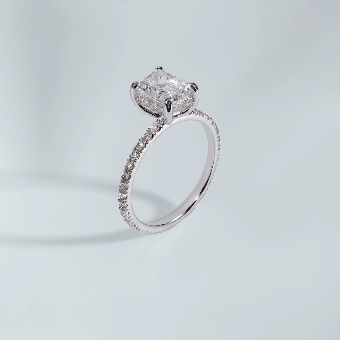 Elongated Radiant Hidden Halo Engagement Ring