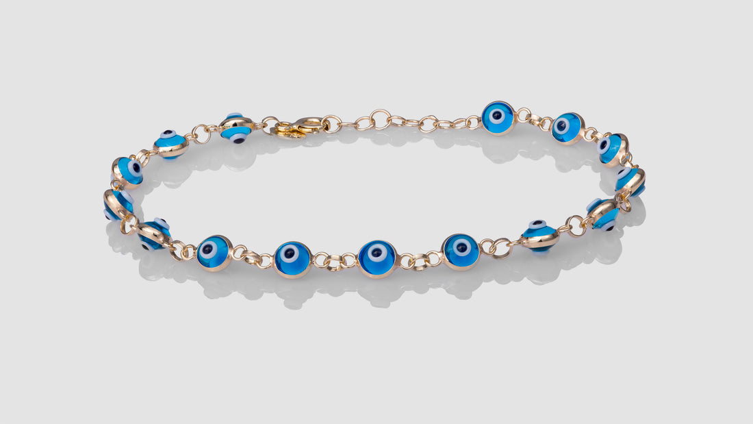 10K Yellow Gold Light Blue Eye Bracelet